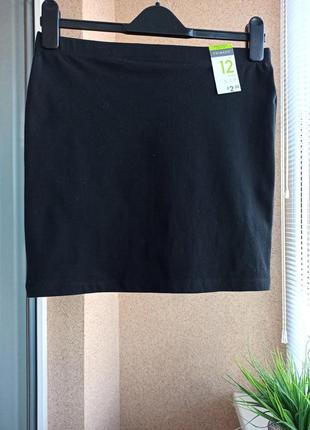 Черная качественная трикотажная прямая юбка мини по фигуре6 фото