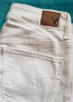 Джинсы белые