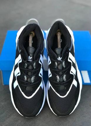 Легкие спортивные кроссовки демисезонные adidas ozweego черные в сеточку4 фото