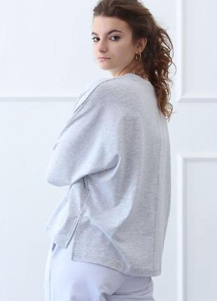 Однотонна футболка бавовна вільного крою з рукавами кажан р. 42-502 фото
