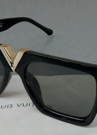 Louis vuitton стильные женские солнцезащитные очки черные с золотым логотипом3 фото