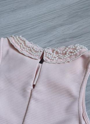 Персиковая блуза в рубчик с баской и бусинами на воротнике5 фото