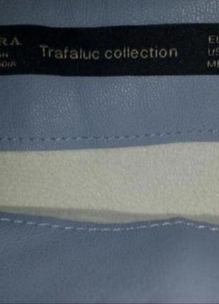Светло-голубая мини юбка с воланами текстиль под кожу7 фото
