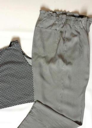 Женские широкие летние свободные   брюки в мелкую клетку чёрно- белую3 фото