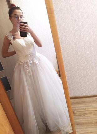 Весільна сукня з вишивкою ручної роботи8 фото