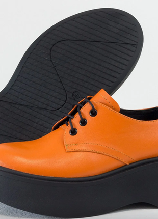 Эксклюзивные кожаные туфли на платформе оранжевого цвета6 фото