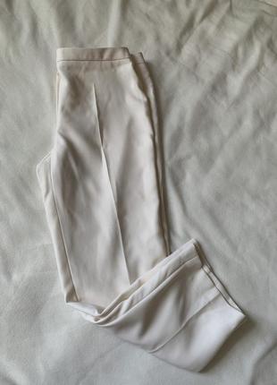 Шерстяные белые фирменные брюки