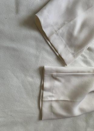 Шерстяные белые фирменные брюки8 фото