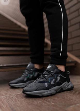 Стильные мужские кроссовки демисезонные adidas ozweego черные