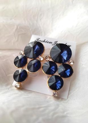 Красиві сережки синього кольору