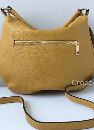 Удобная минималистичная итальянская сумка-хобо 29595 с длинным плечевым ремешком9 фото