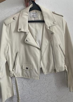 Біла кожанка