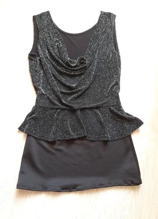 Мерехтливе чорне міні плаття або нарядна блузка