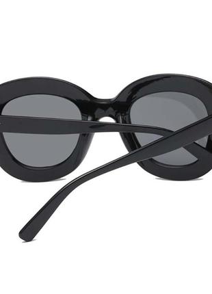 Стильні чорні округлі окуляри з димчастим сірої лінзою і глянсовою оригінальної оправою4 фото