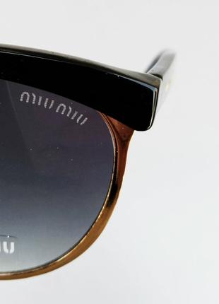 Очки в стиле miu miu женские солнцезащитные серый градиент в золотом металле10 фото