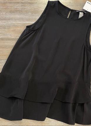 Чорна блуза з асиметричним краєм4 фото