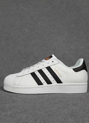 Женские кроссовки adidas superstar белые с чёрным3 фото