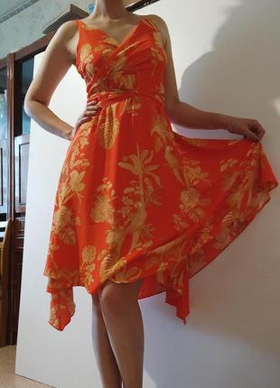 Помаранчеве асиметричне плаття з соковитим тропічним принтом