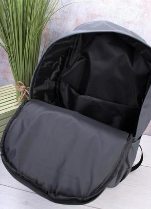 Стильний сірий рюкзак з принтом4 фото