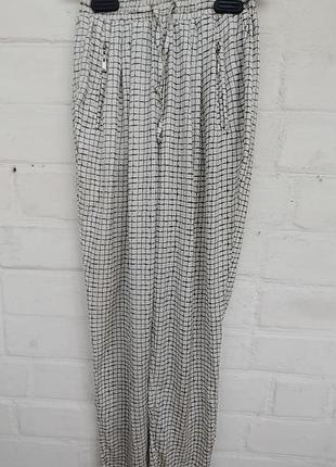 Брюки в клетку