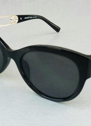 Versace стильные женские солнцезащитные очки черные с золотым логотипом1 фото