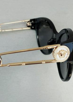 Versace стильные женские солнцезащитные очки черные с золотым логотипом8 фото