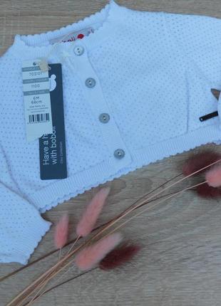 Нове болеро для дівчинки білого кольору з гудзиками розмір 6м 68 см boboli1 фото