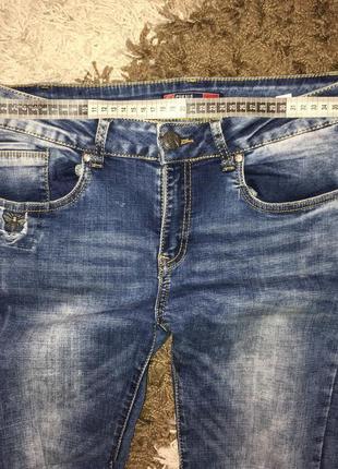 Стильні джинси скінні з рваностями, м-л8 фото