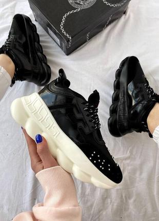 Женские стильные чёрные кроссовки на массивной подошве chain reaction под известный бренд жіночі чорні трендові кросівки під відомий бренд3 фото