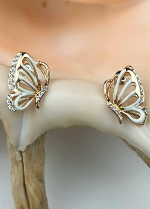 Серьги сережки гвоздики пуссеты бабочки золотистые с белой эмалью и кристаллами новые качественные2 фото