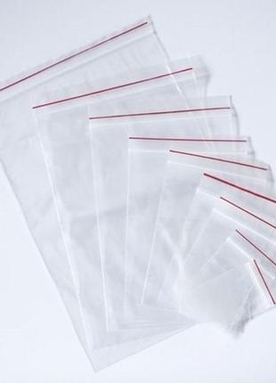 Вакуумні пакети для зберігання одягу 30х40см поліетиленова упаковка7 фото