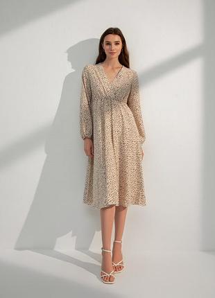 Сукня з v-подібним вирізом а-силуету