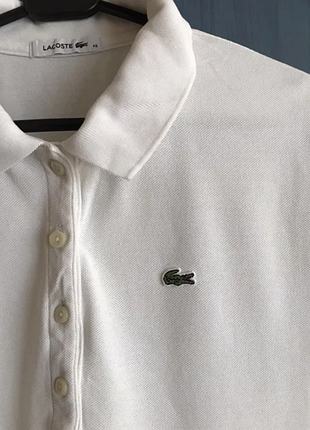 Белое поло lacoste