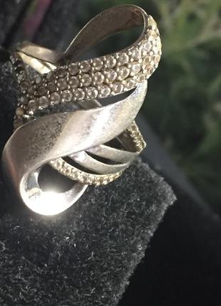Серебряное кольцо с цирконием:знак бесконечности.6 фото