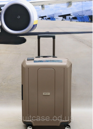 Французский ударостойкий чемодан из поликарбоната на 4-ых колесах airtex paris9 фото