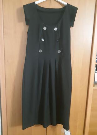 Сарафан на дівчинку підлітка для школи