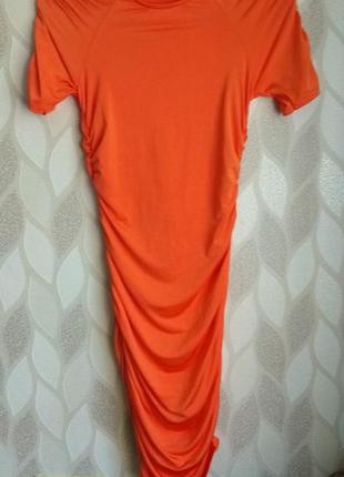 Оранжеве плаття зі збірками5 фото