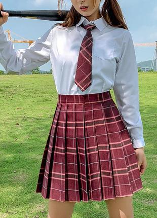 Бордовая юбка в складку в школьном стиле2 фото