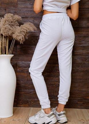 Стильные женские спортивные штаны на манжетах белые женские спортивные штаны с манжетами4 фото