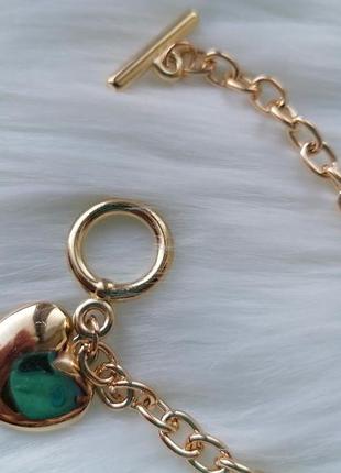 Яркий металлический золотой браслет-цепочка с крупной подвеской сердечко и замком кольцо4 фото