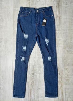 Новые джинсы скинни с рваностями синие3 фото