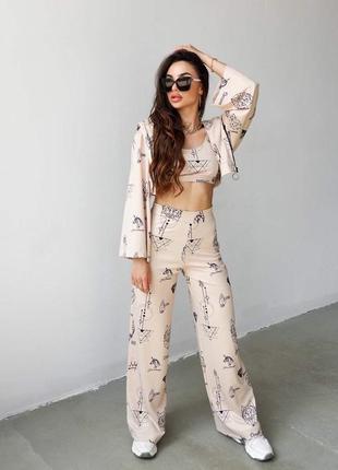Розкішний костюм трійка бомбер топ і штани палаццо з написами