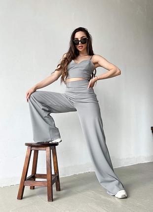 Розкішний костюм трійка бомбер топ і штани палаццо