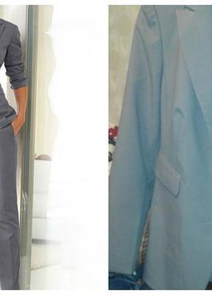 Брючний костюм з тканого матеріалу.