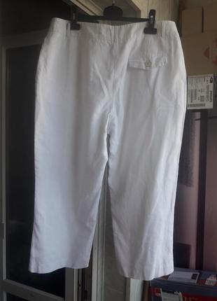 Белоснежные льняные брюки длиной 7/85 фото