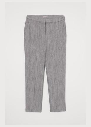 Класичні брюки з фактурної тканини