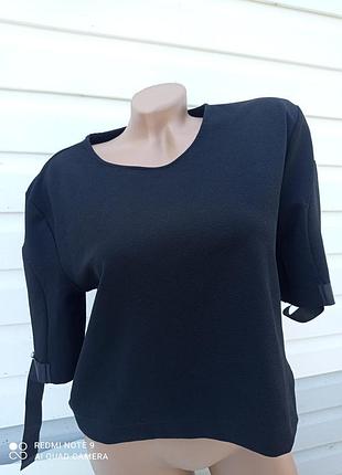 Укорочена кофточка з заклепками3 фото