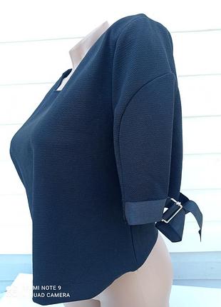 Укорочена кофточка з заклепками2 фото