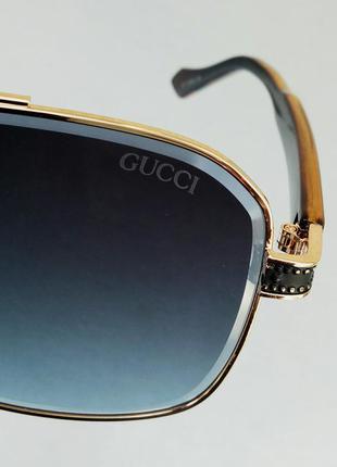 Gucci очки мужские солнцезащитные серо синий градиент в золотом металле дужки кз8 фото