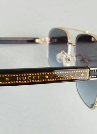 Gucci очки мужские солнцезащитные серо синий градиент в золотом металле дужки кз7 фото